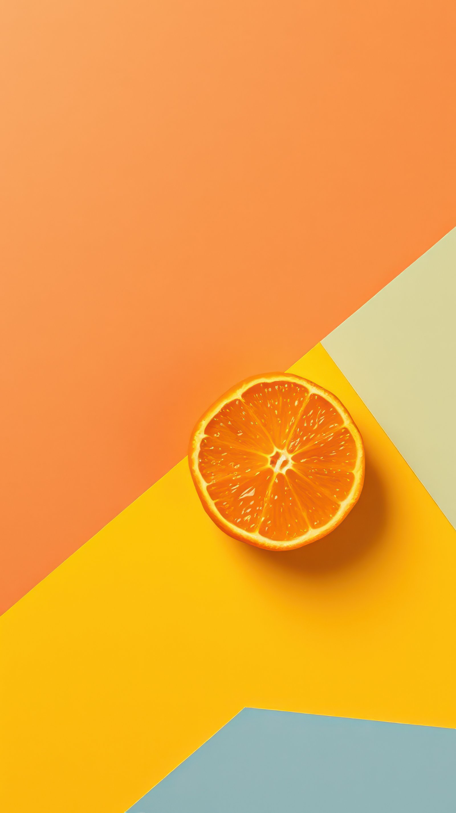 Bright orange slice on colorful geometric background showcasing vibrant food aesthetics in a minimalistic setting